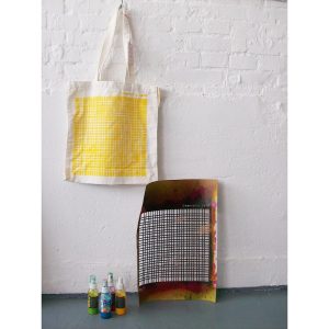 "Geometric Love" canvas bag with the materials used to paint it
