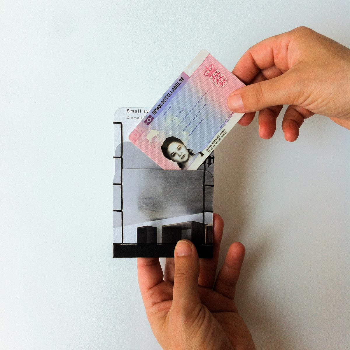 Collaborations-Hacked-Mater-Earth-Gallery-Card-Holder-Usage-Hamide-Design-Studio "Hacked!" cardholder for Mater Earth Gallery shown in usage
