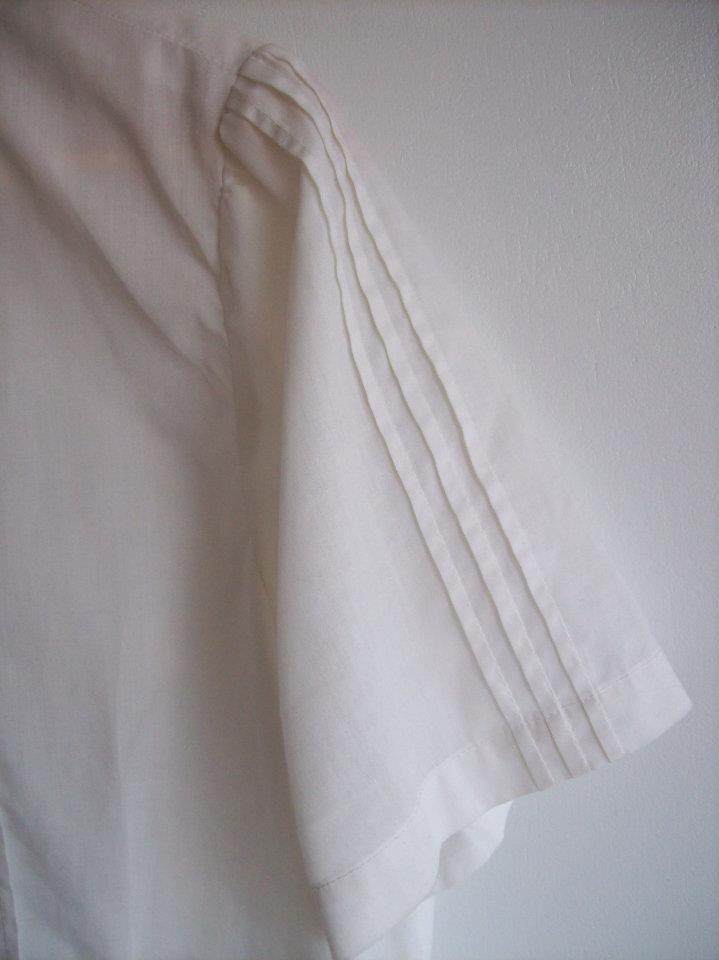 Blog-Originals-Blouse-White-Arm-Hamide-Design-Studio Arm detail from the white blouse from Hamide's Originals series