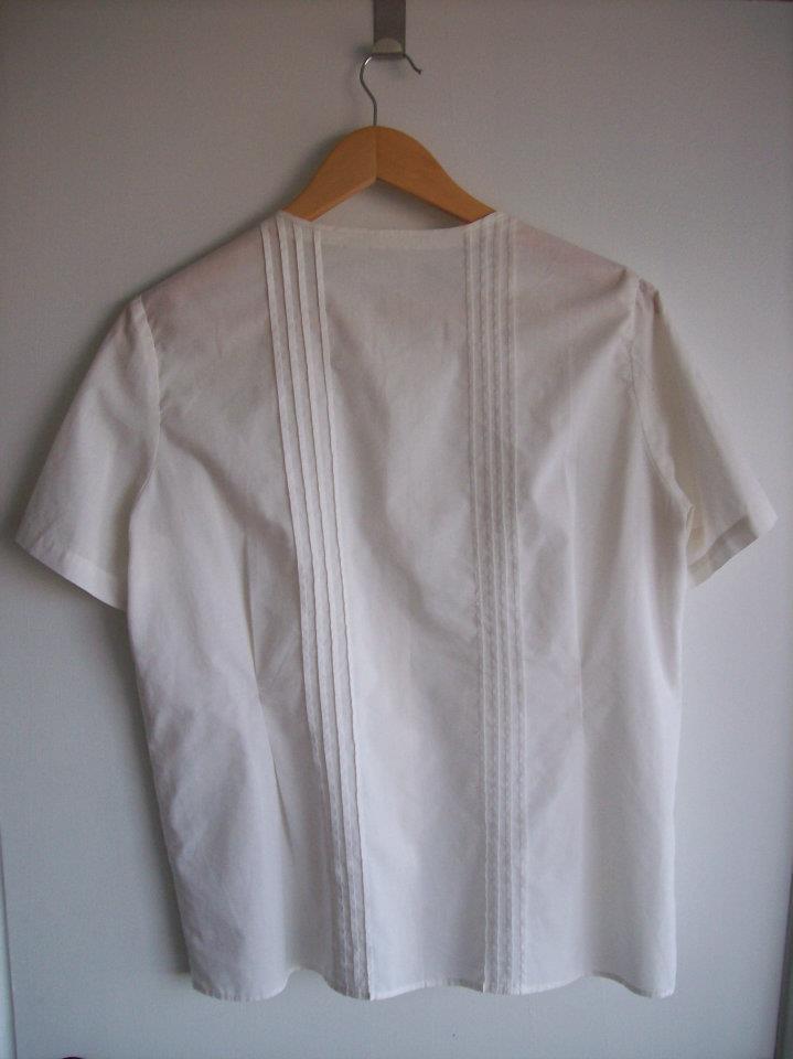 The back side of the white blouse from Hamide's Originals series