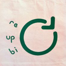 Close-up of the print on the Re-Up-Bi-Cycle canvas bag
