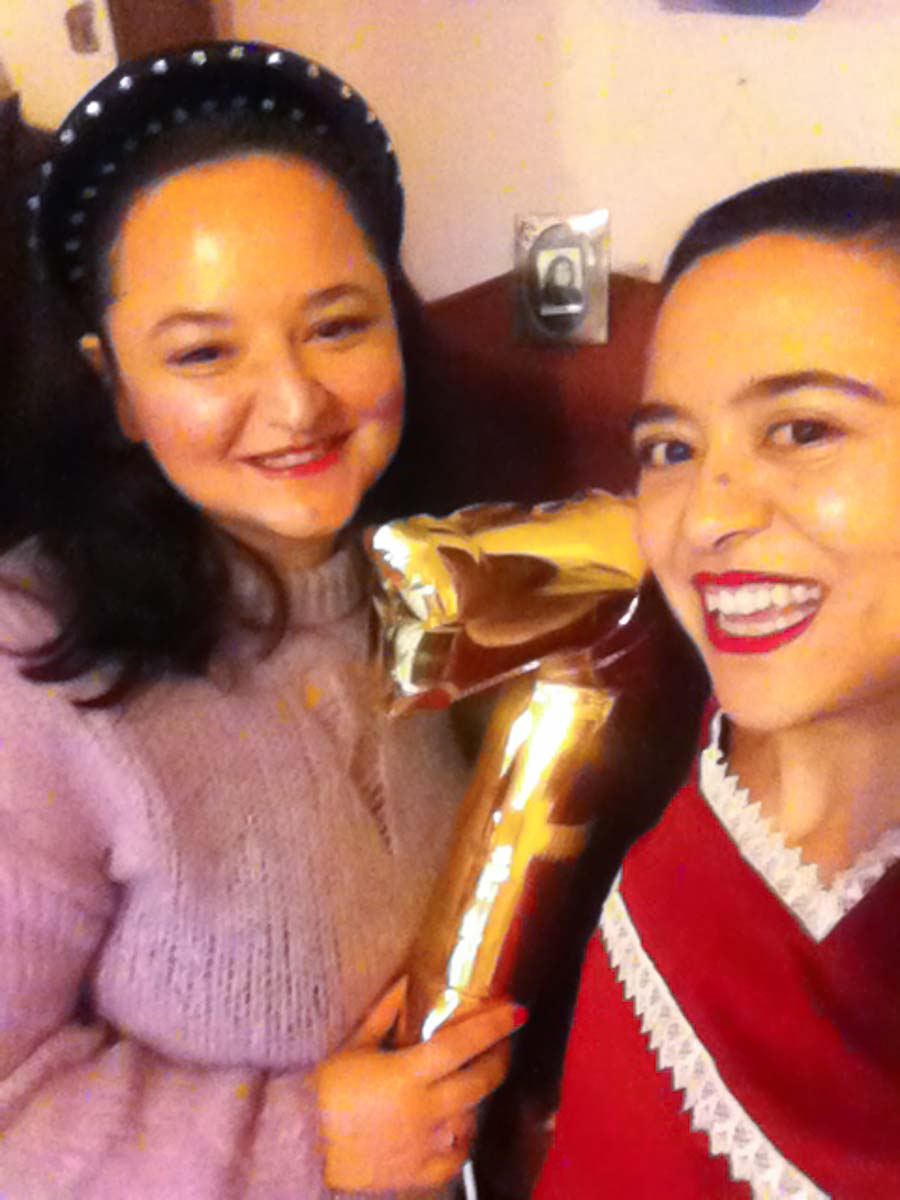 Blog-Officially-Seven-Balloon-Selfie-Hamide-Design-Studio Seda and Seyda in a selfie holding a balloon shaped like number 7