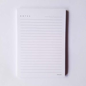 Ruled Hamide Basics notepad in white background in A6 size