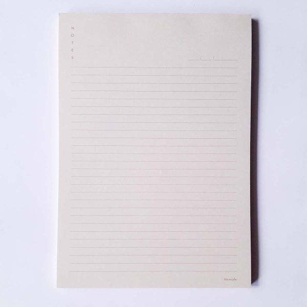 Ruled Hamide Basics notepad in light peach background in A6 size
