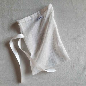 Medium reusable tulle sac in white with blue stripes for shopping groceries