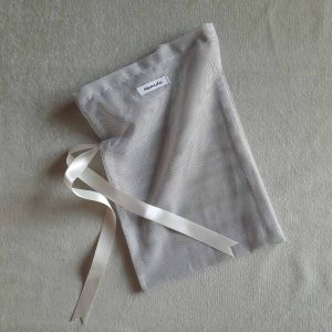 Medium reusable tulle sac in dusty blue for shopping groceries