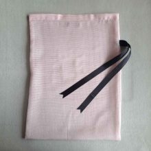 Front of large reusable tulle sac in pink for shopping groceries