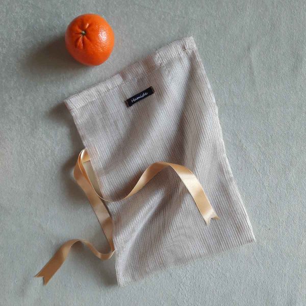 Medium reusable tulle sac in brown for shopping groceries