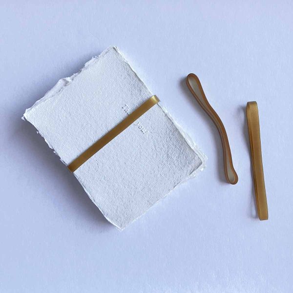 Elastic band holding cards