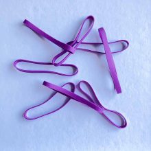 A few elastic bands in purple